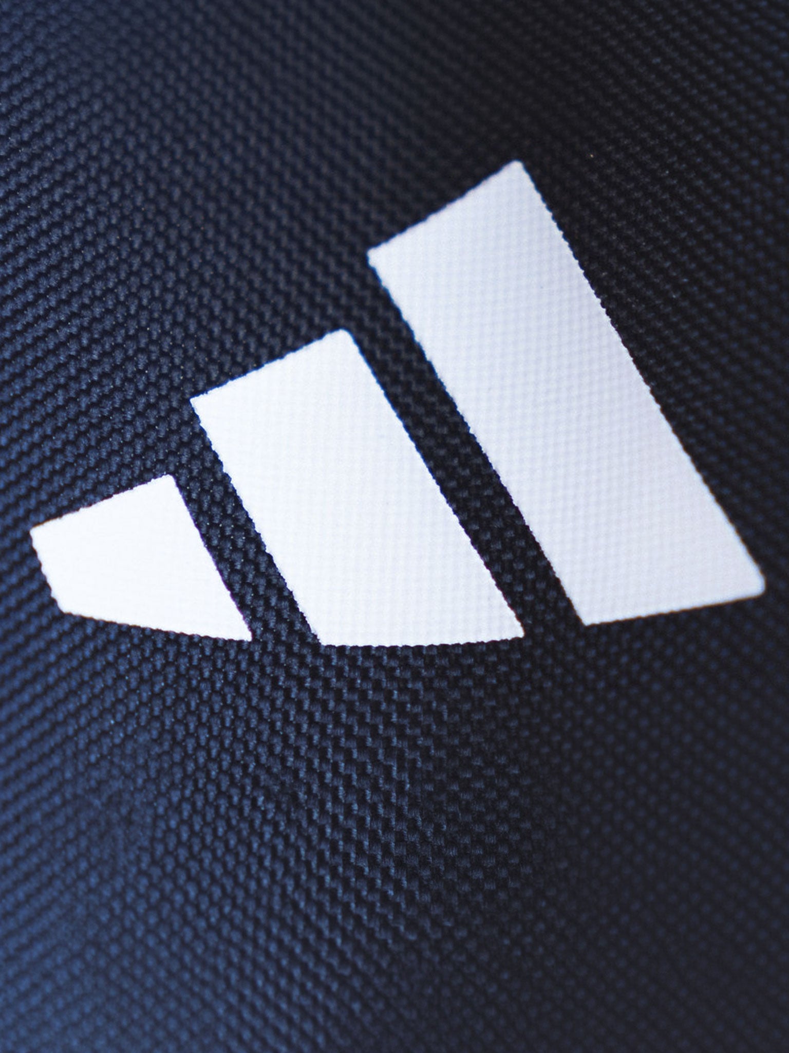 Close up view of adidas logo on the adidas Team Scotland Backpack.