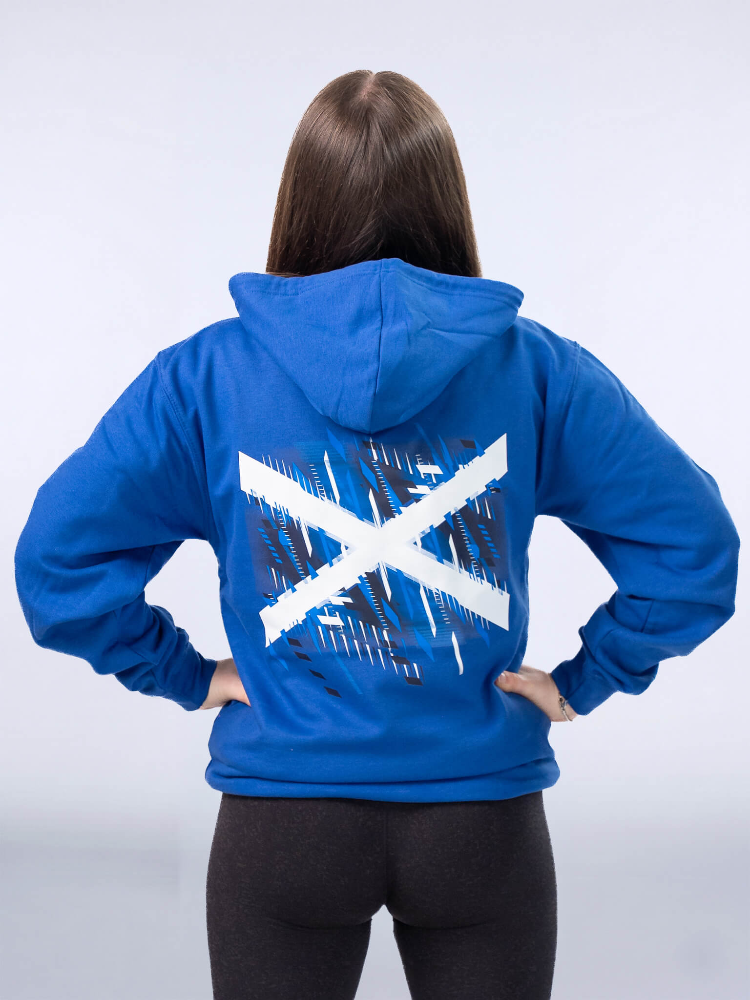 Back view of Royal Blue G2026 x Team Scotland Hoodie with Saltire graphic worn by athlete Beth Riva