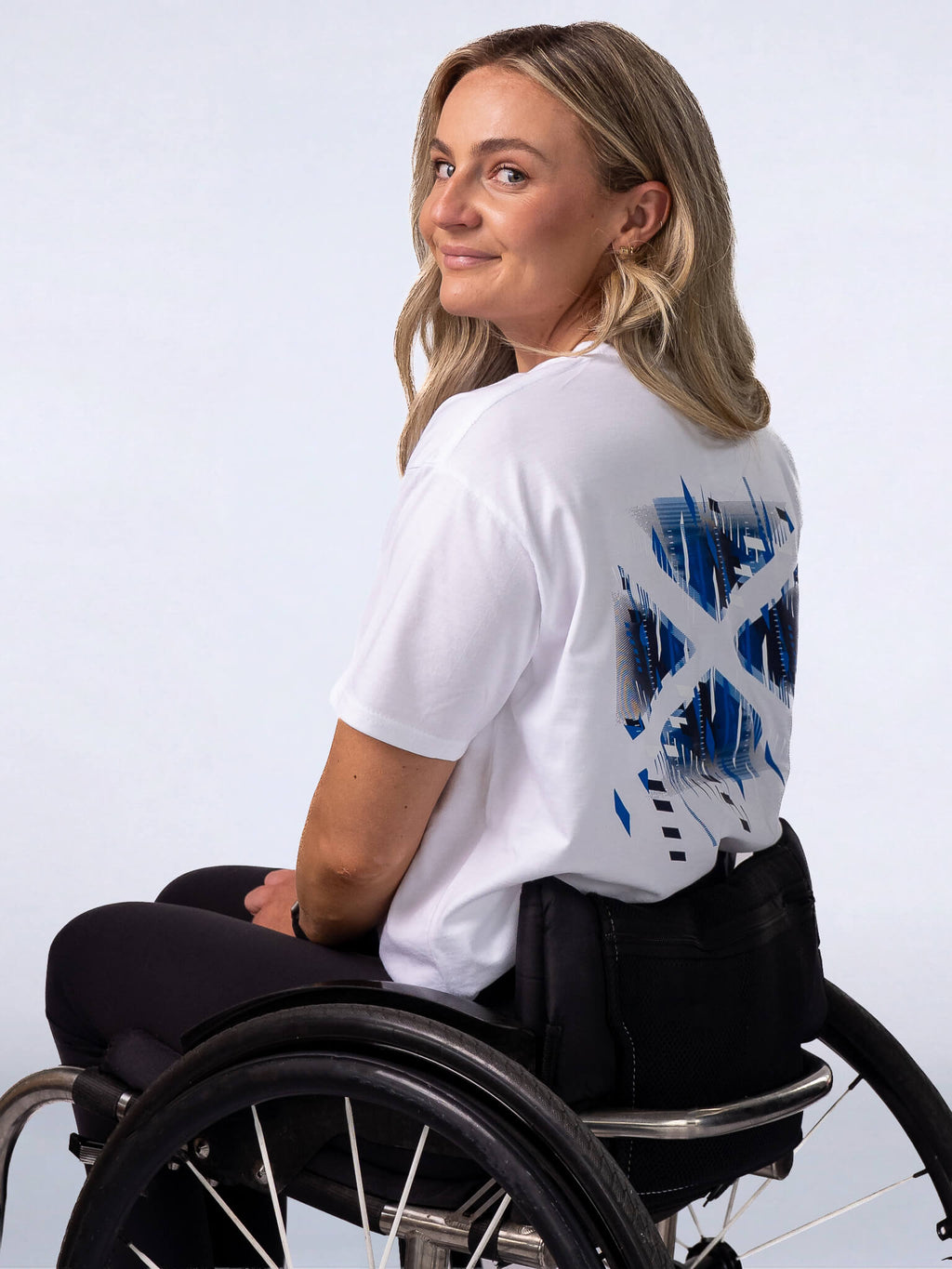 Back view of White G2026 x Team Scotland T-Shirt worn by athlete Melanie Woods