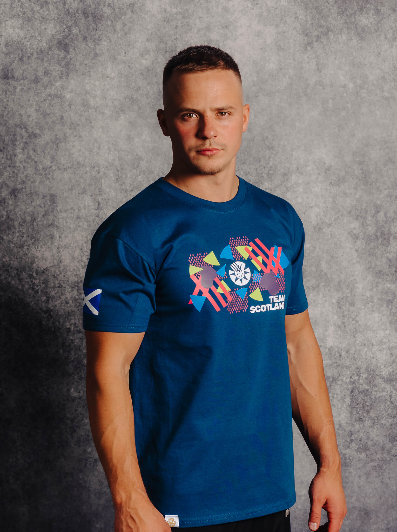 Mountain Blue Team Scotland Graphic T-Shirt worn by athlete Pavel Karnejenko