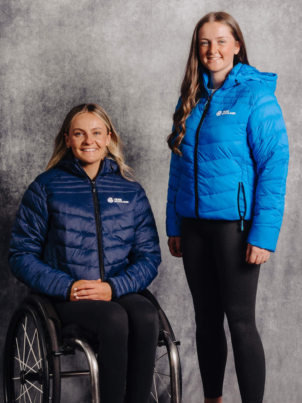 Navy & Ocean Blue Team Scotland Logo Padded Jackets worn by athletes Melanie Woods and Beth Riva