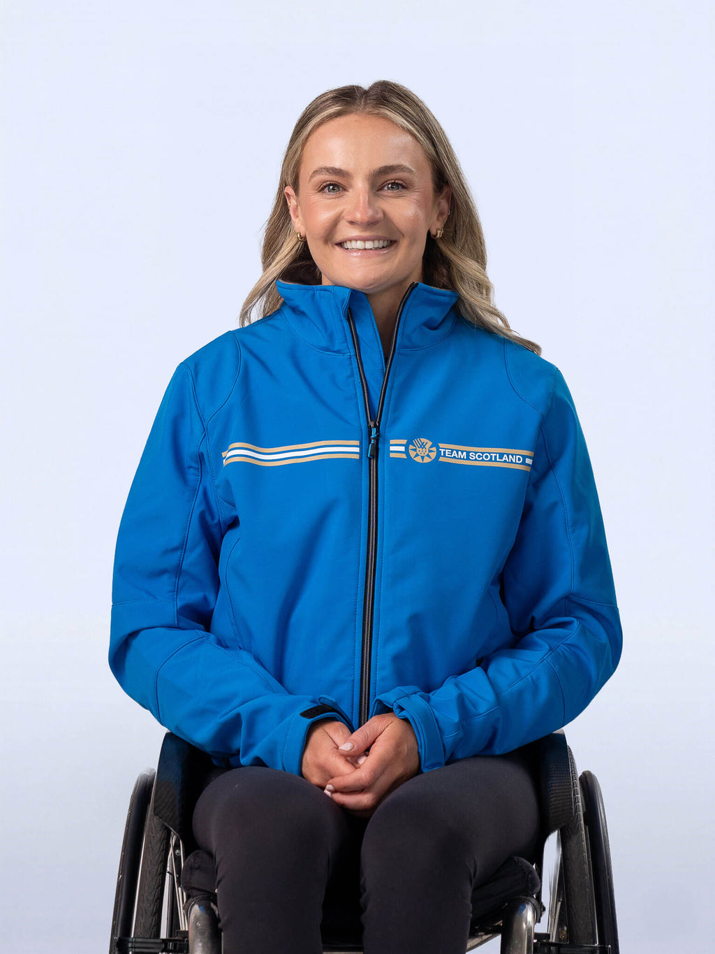 Bright Blue Team Scotland Logo Track Jacket worn by athlete Melanie Woods